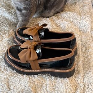 Elegant Black and Brown Women's Loafer with bow
New-never worn size 41- 10us